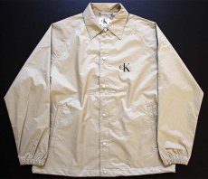 画像1: 90s Calvin Klein Jeans カルバンクライン ロゴ ナイロン コーチジャケット グレーベージュ L (1)