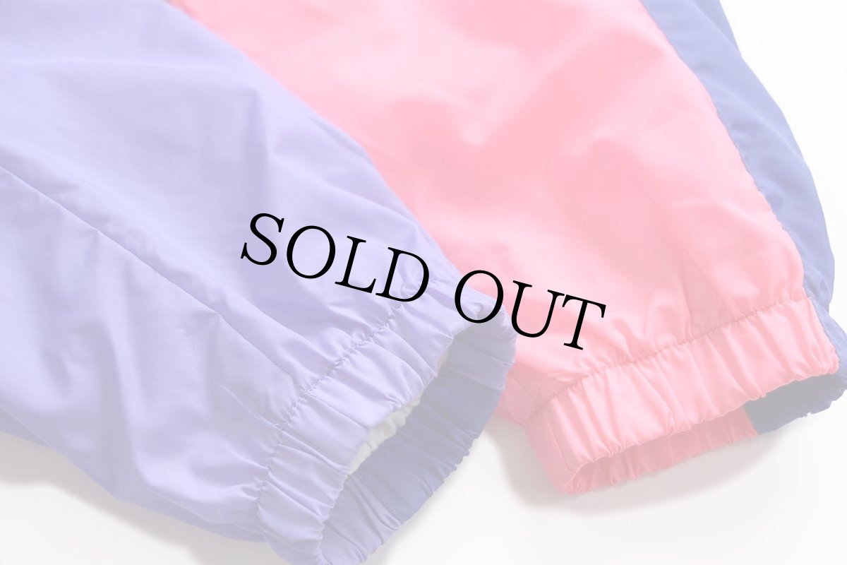 画像6: 90s NIKEナイキ ロゴ刺繍 マルチカラー アシンメトリー ナイロンジャケット 蛍光 M (6)