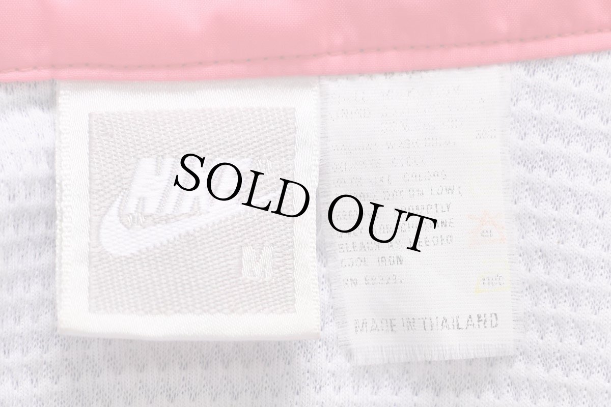 画像4: 90s NIKEナイキ ロゴ刺繍 マルチカラー アシンメトリー ナイロンジャケット 蛍光 M (4)