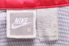 画像4: 90s NIKEナイキ ロゴ刺繍 マルチカラー アシンメトリー ナイロンジャケット 蛍光 M (4)