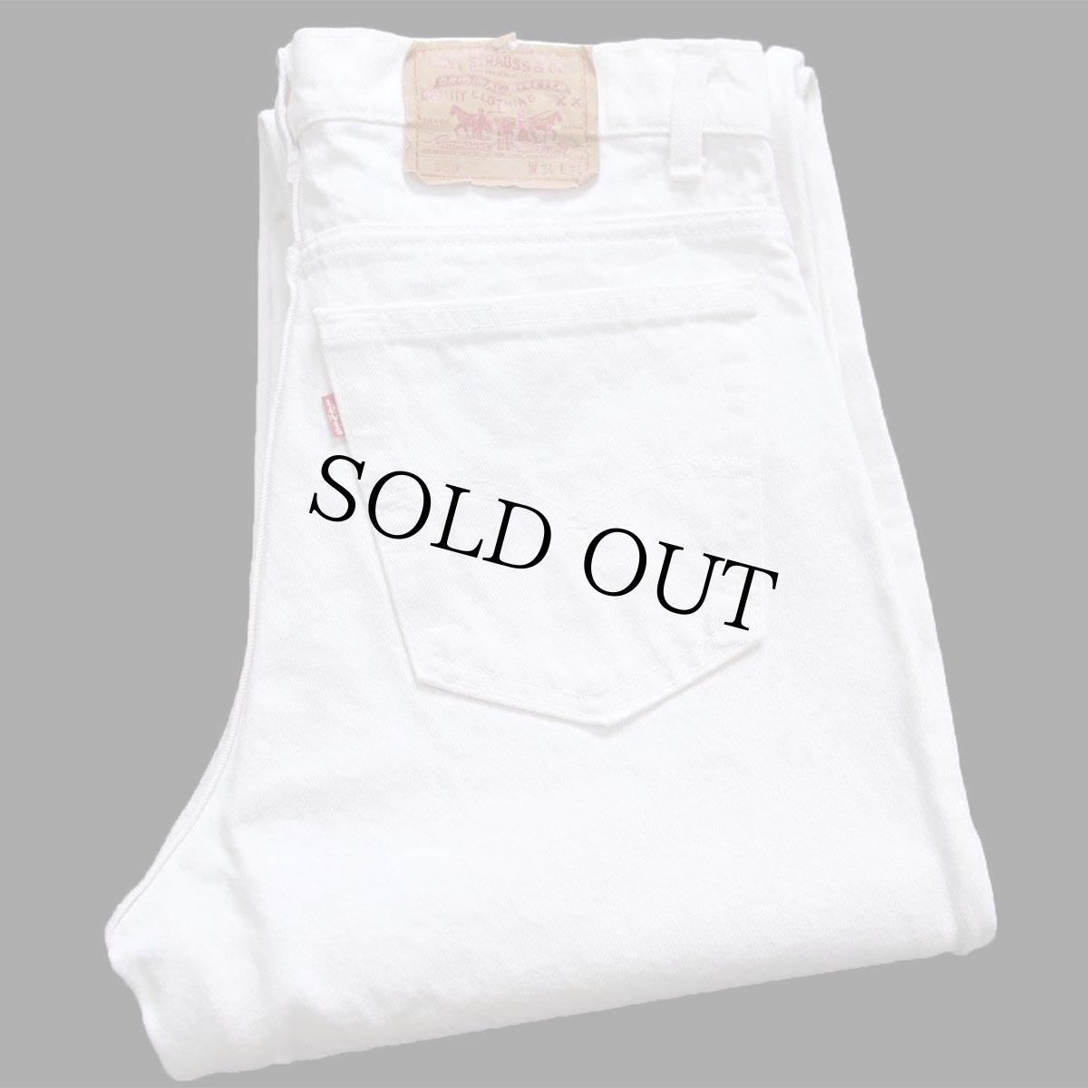 画像1: 90s USA製 Levi'sリーバイス 550 ホワイト デニムパンツ W34 L34 (1)