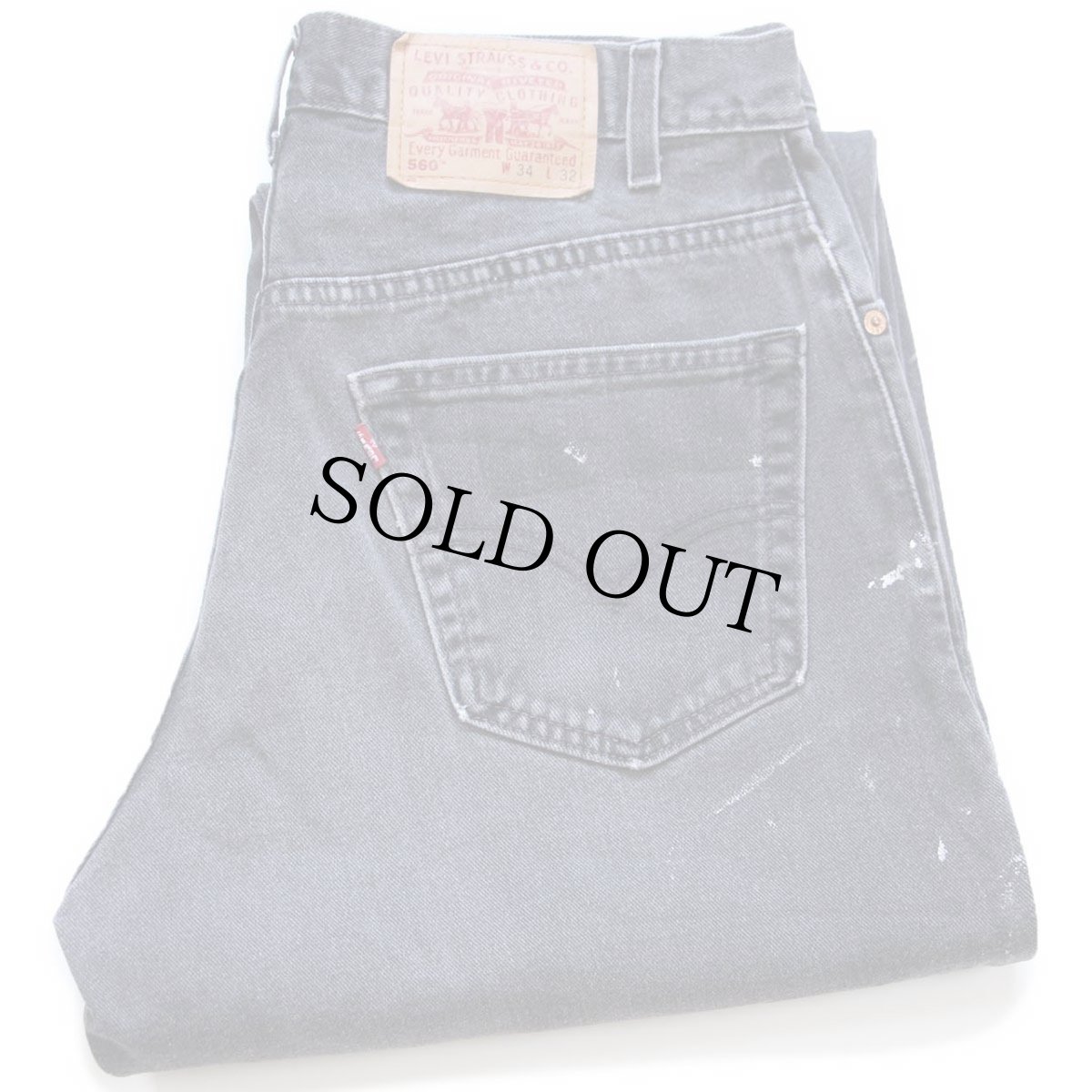 画像1: 00s Levi'sリーバイス 560 ペンキ飛び ブラック デニムパンツ フェード W34 L32 (1)