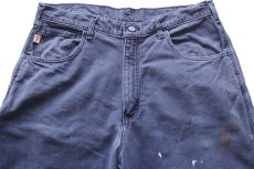 画像4: メキシコ製 carharttカーハート FR CAT2 ペンキ飛び ダック地 ワークパンツ 紺 フェード W34 L36 (4)
