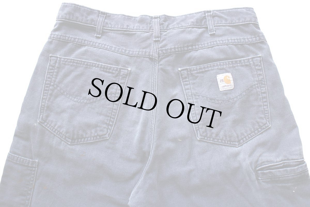 画像5: メキシコ製 carharttカーハート FR CAT2 ペンキ飛び ダック地 ワークパンツ 紺 フェード W34 L36 (5)