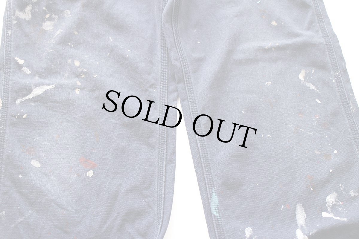 画像9: メキシコ製 carharttカーハート FR CAT2 ペンキ飛び ダック地 ワークパンツ 紺 フェード W34 L36 (9)