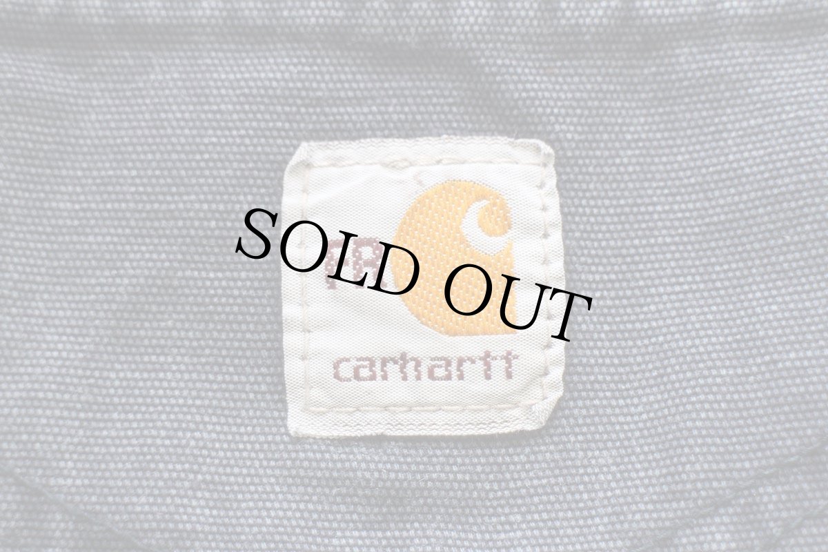 画像6: メキシコ製 carharttカーハート FR CAT2 ペンキ飛び ダック地 ワークパンツ 紺 フェード W34 L36 (6)