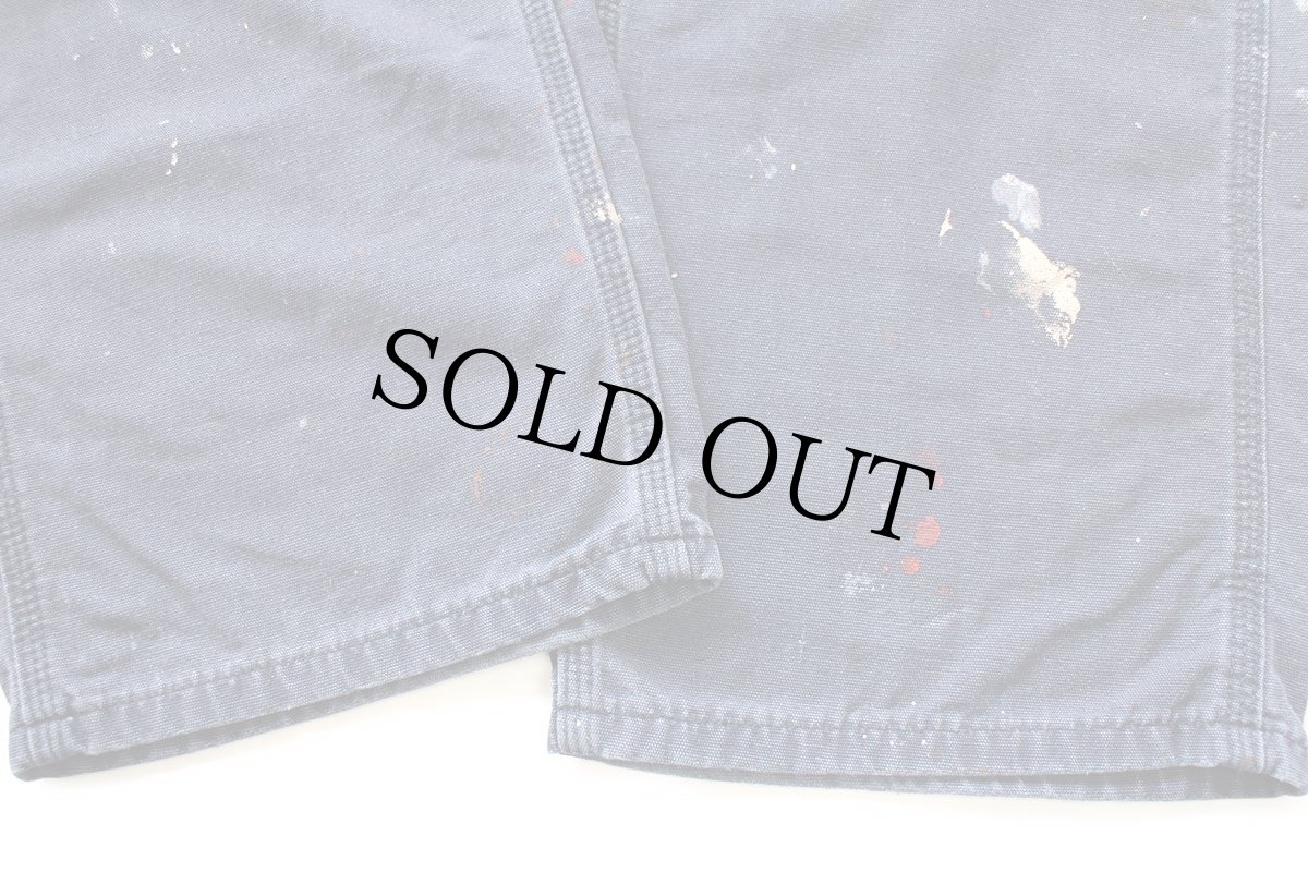 画像10: メキシコ製 carharttカーハート FR CAT2 ペンキ飛び ダック地 ワークパンツ 紺 フェード W34 L36 (10)