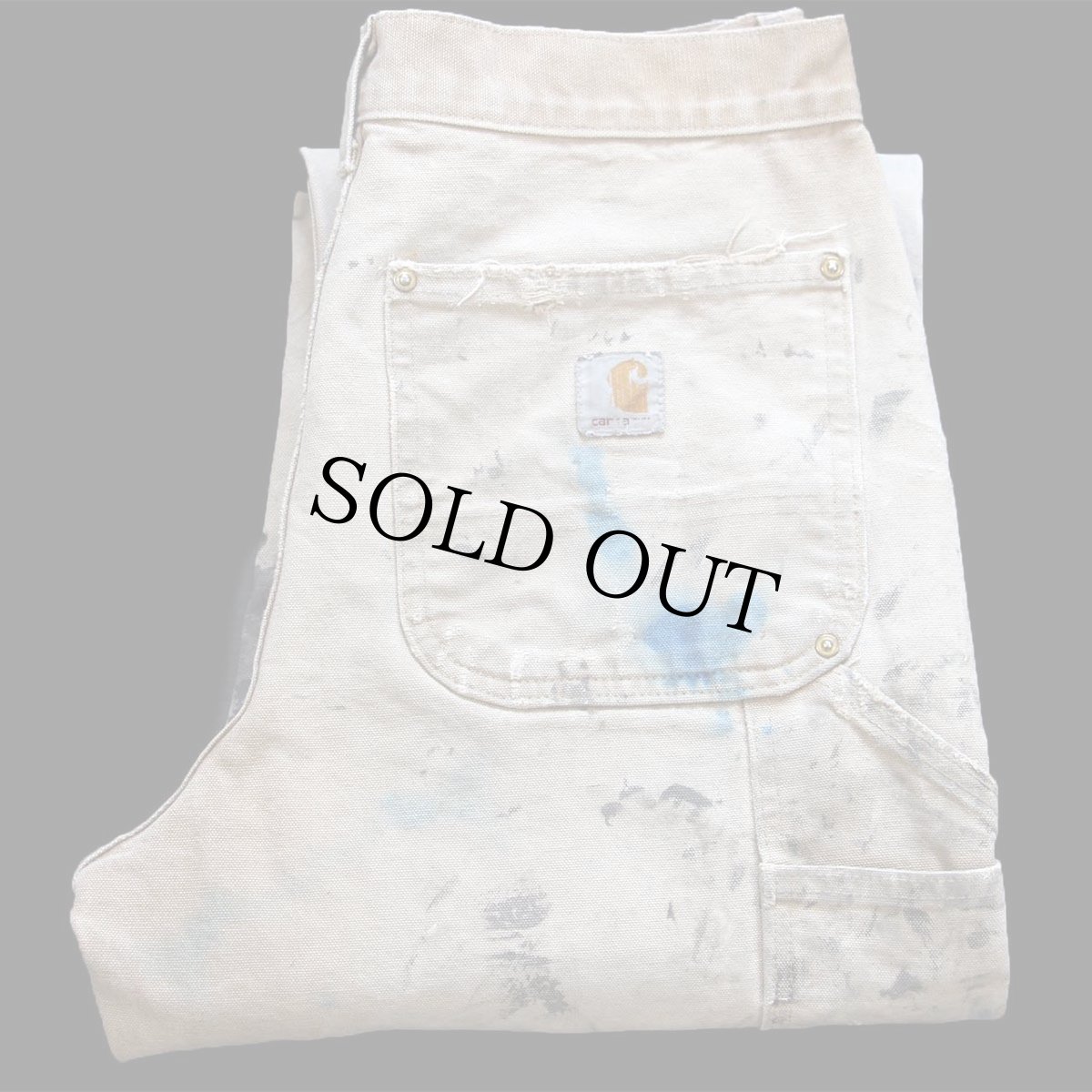 画像1: USA製 carharttカーハート ペンキ飛び ダブルニー ダック地 ペインターパンツ ボロ 茶 フェード W31 L32 (1)