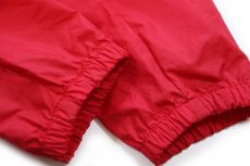 画像7: 90s USA製 Championチャンピオン PATCHOGUE-MEDFORD 12 RAIDERS 両面プリント ナイロンジャケット 赤 (7)