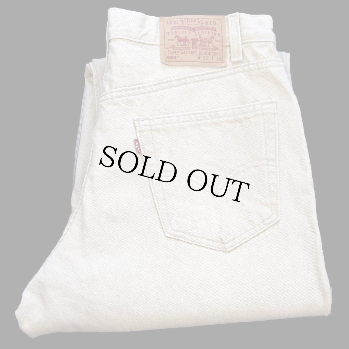 画像1: 90s USA製 Levi'sリーバイス 550 先染め カラーデニムパンツ カーキ W36 L30 (1)