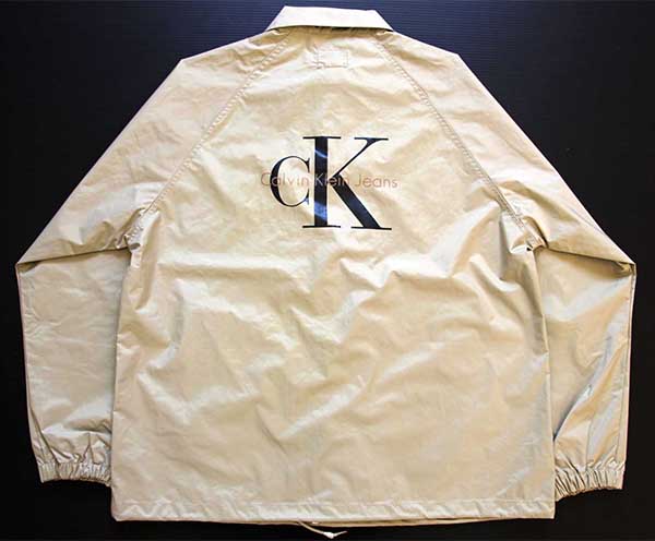 90s Calvin Klein Jeans 繧ｫ繝ｫ繝舌Φ繧ｯ繝ｩ繧､繝ｳ 繝ｭ繧ｴ 繝翫う繝ｭ繝ｳ 繧ｳ繝ｼ繝√ず繝｣繧ｱ繝�繝� 繧ｰ繝ｬ繝ｼ繝吶�ｼ繧ｸ繝･ L Sixpacjoe Web  Shop
